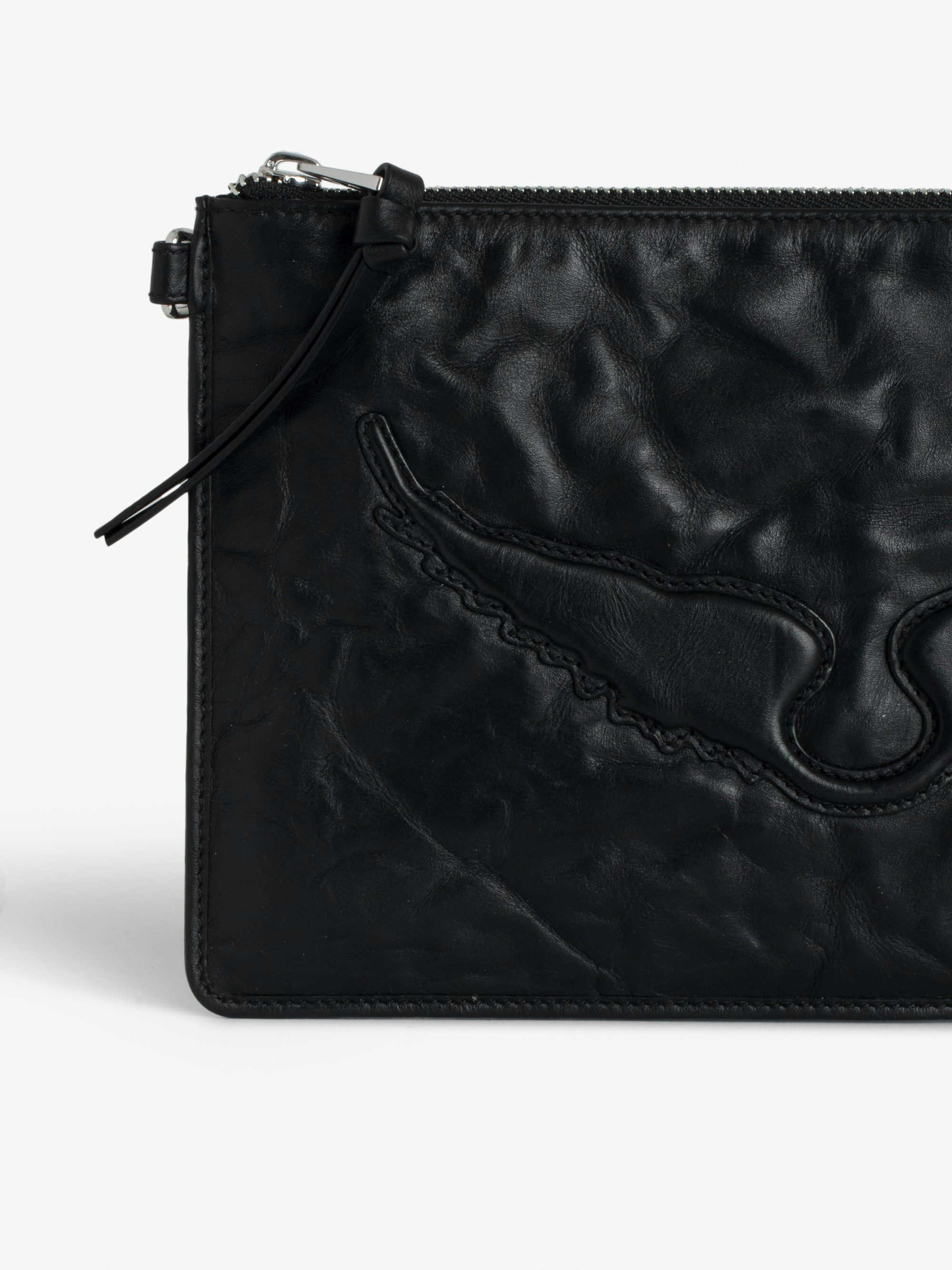 Angel Pochette - Grained leather clutch adorned with an embossed wing signature.